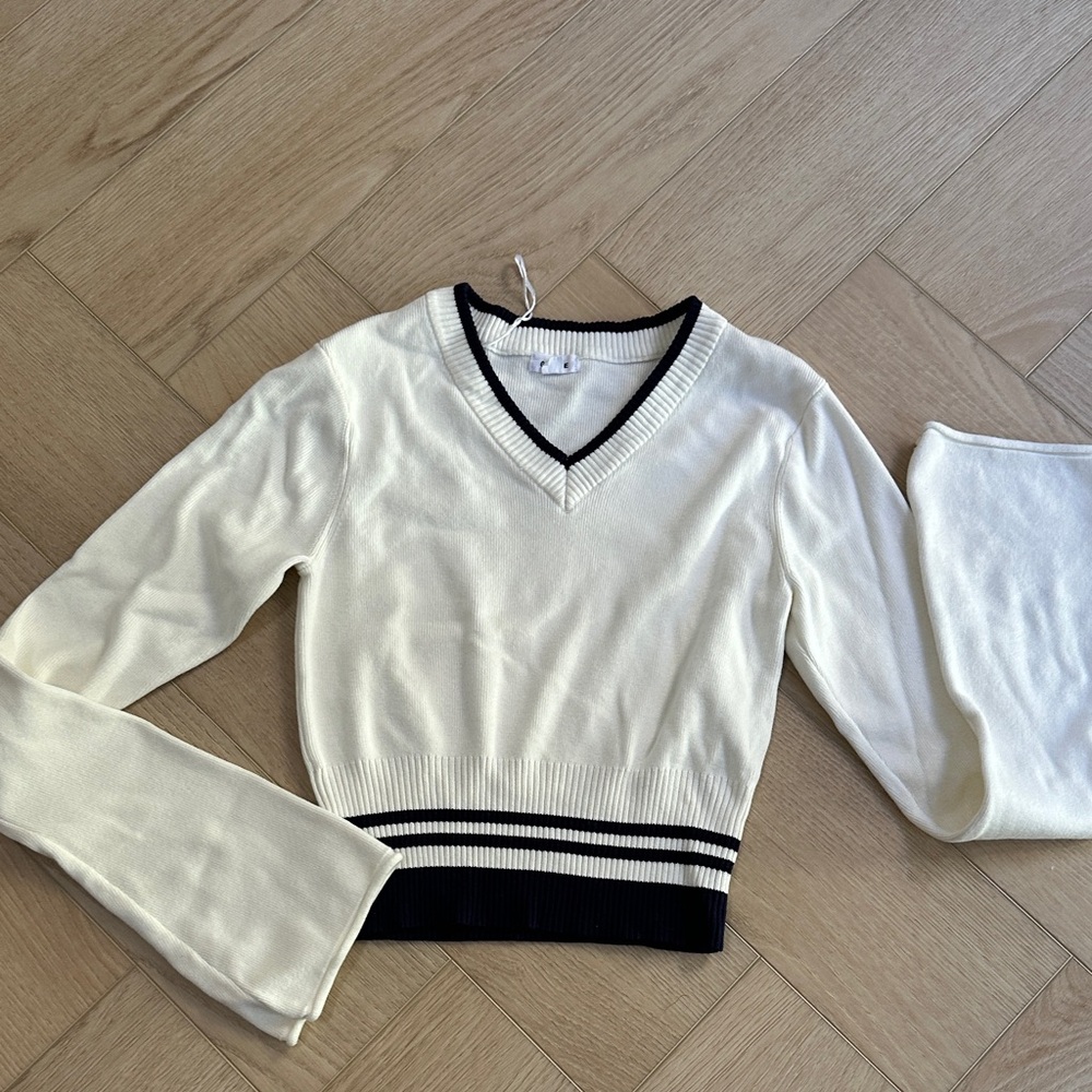 Garage Cream V-Neck Sweater with Black Accents